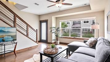 Townhome, Multiple Beds, Kitchen, Garden View (850 Baum St. (Unit C)) | Living area | 50-inch flat-screen TV with cable channels, TV