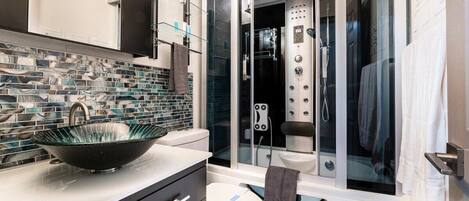 Bathtub, hair dryer, towels