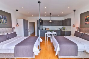 Basic Quadruple Room | Individually furnished, free WiFi, bed sheets