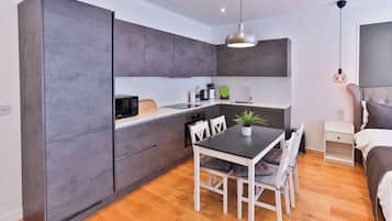 Basic Quadruple Room | Private kitchen | Fridge, oven, stovetop, electric kettle