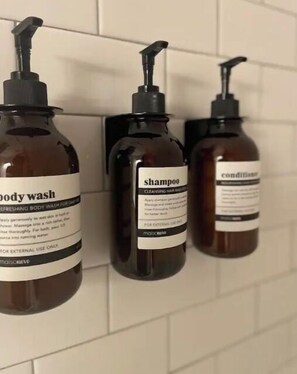 Shower, hair dryer, towels, soap