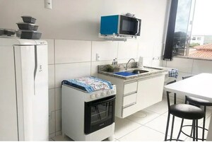 Apartamento | Cozinha privada | Micro-ondas, liquidificador, talheres/pratos/utensílios de cozinha
