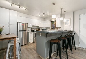 Condo, Multiple Beds, Patio, Garden View (220 Peterson St Unit 1) | Private kitchen | Fridge, microwave, oven, stovetop - Caviar Suite, Moody Retreat by Old Town Square (Fort Collins)