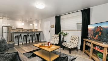 Condo, Multiple Beds, Patio, Garden View (220 Peterson St Unit 1) | Living area | 50-inch flat-screen TV with digital channels