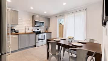 Townhome, Multiple Beds, Patio, Garden View (1751 E 16th St. Loveland) | Private kitchen | Fridge, microwave, oven, stovetop