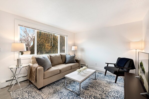 Townhome, Multiple Beds, Patio, Garden View (1755 E 16th St. Loveland) | Living area | 50-inch flat-screen TV with digital channels, TV - Comfortable Abode Near Historic Downtown (Loveland)