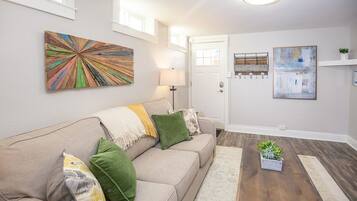 Apartment, Multiple Beds, Kitchen, Garden View (1534 10th Ave. - Lower) | Living area | 40-inch TV with digital channels
