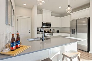 House, Multiple Beds, Patio, Garden View (2908 Barnstormer St Unit #1) | Private kitchen - Hidden Gem – Brand New Curated Home W Pool Access (Fort Collins)