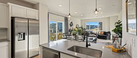 House, Multiple Beds, Patio, Garden View (2908 Barnstormer St Unit #1) | Private kitchen | Fridge, microwave, oven, stovetop