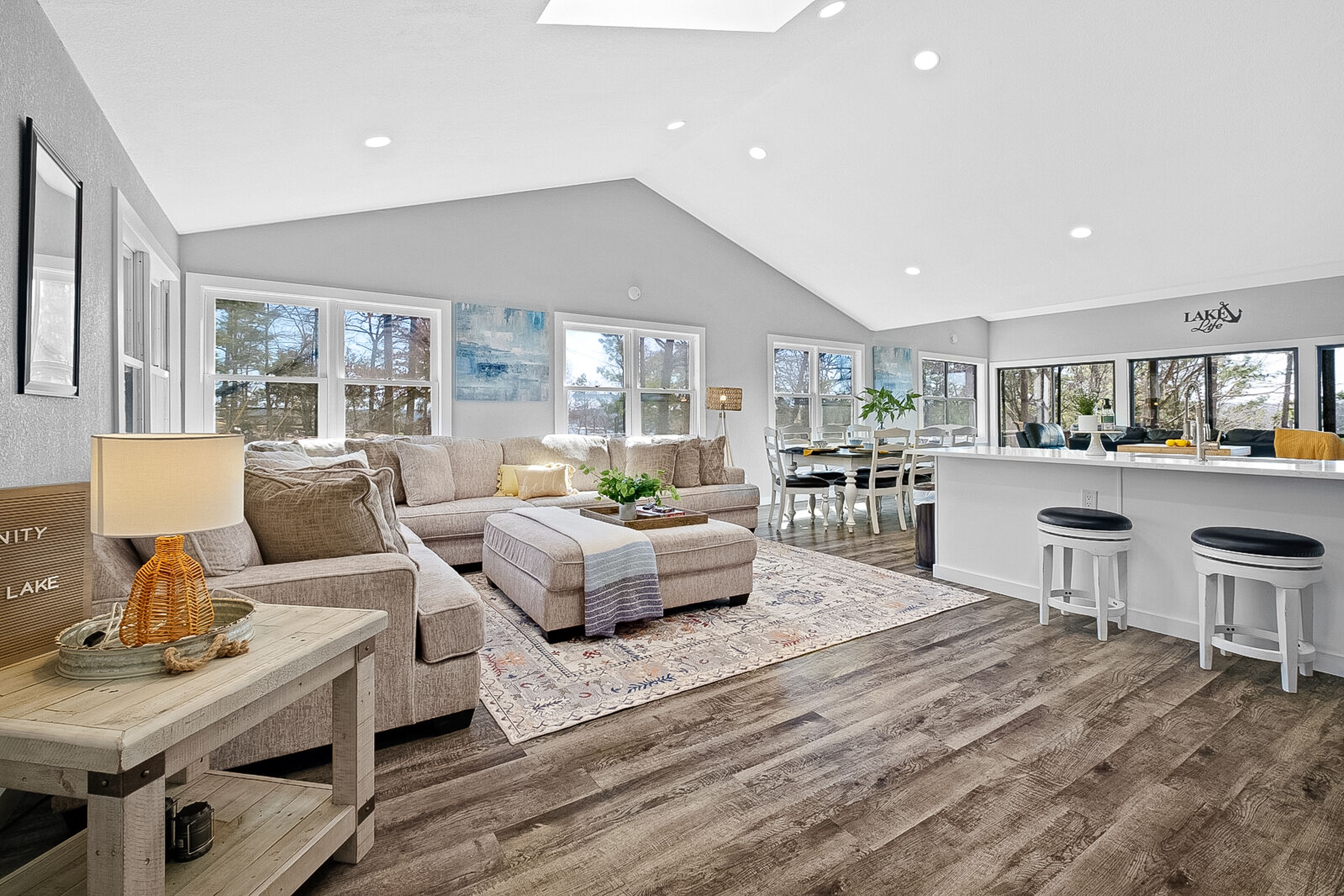 Lakefront home with a game room, washer/dryer, central AC & firepit