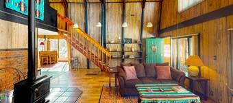 Rustic home with mountain views, wood-burning stove, basketball court, & patio