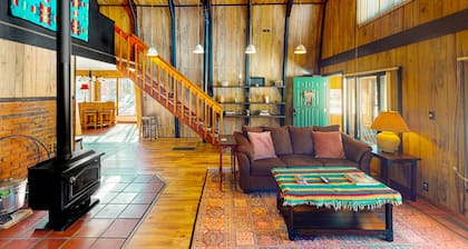 Rustic home with mountain views, wood-burning stove, basketball court, & patio