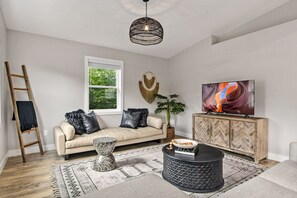 Apartment, Multiple Beds, Patio, Garden View (317 Stover St. Unit C) | Living area | 40-inch TV with digital channels - Spacious Downtown Apartment – Walk to Old Town Fc! (Fort Collins)