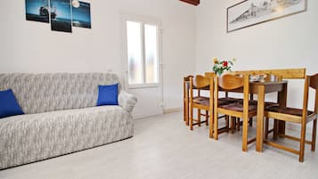 Apartamento (Two Bedroom Apartment with Pool and S) | Sala de jantar