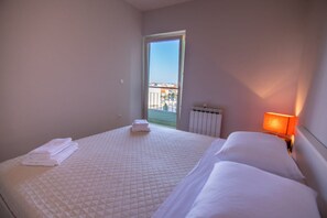 Appartement Familial, 2 chambres, balcon, vue cour intérieure