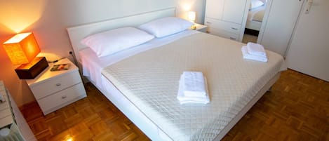 Family Apartment, 2 Bedrooms, Balcony, Courtyard View | 2 bedrooms, blackout drapes, iron/ironing board, free WiFi