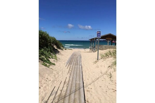 Walk along the beach on a scenic boardwalk.