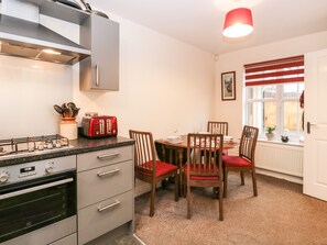 Fridge, electric kettle, toaster, cookware/dishes/utensils