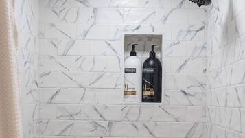 Bathtub, hair dryer, towels