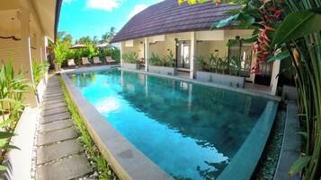 Outdoor pool, open 10:00 AM to 9:00 PM, pool umbrellas, pool loungers