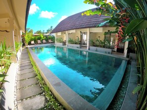 Outdoor pool, open 10:00 AM to 9:00 PM, pool umbrellas, sun loungers