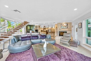Smart TV, fireplace, books, stereo