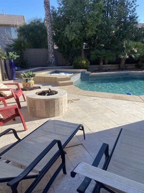 Outdoor pool, a heated pool - 3 Bedroom 2.5 Bath With Hot Tub & Heated Pool! Outside BBQ Area with Fire Pit! (Maricopa)