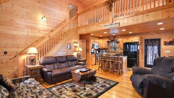 Smart TV, lareira, mesa de pingue-pongue