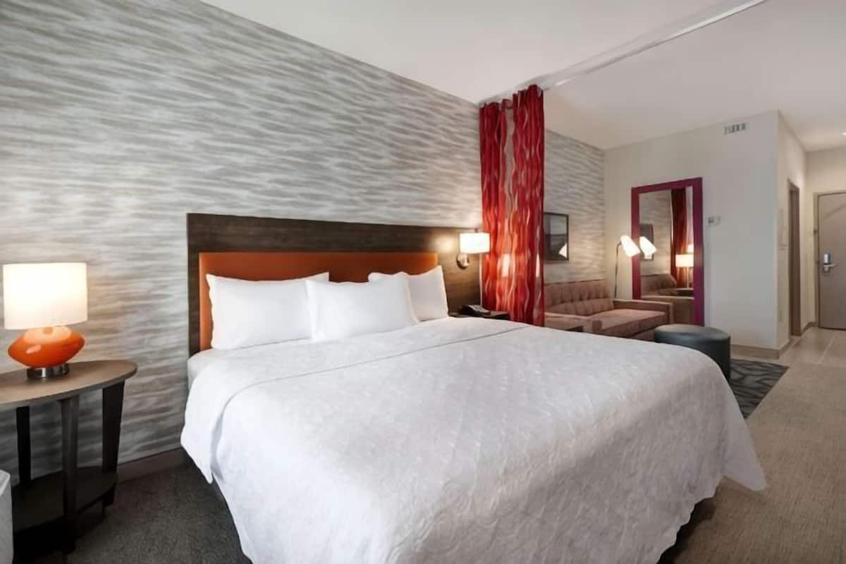 Desk, blackout drapes, iron/ironing board, bed sheets