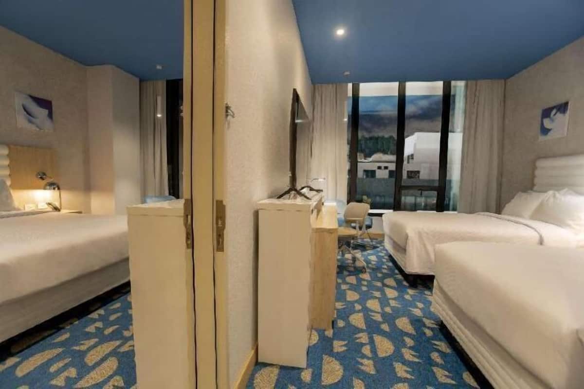 Premium bedding, down comforters, desk, laptop workspace