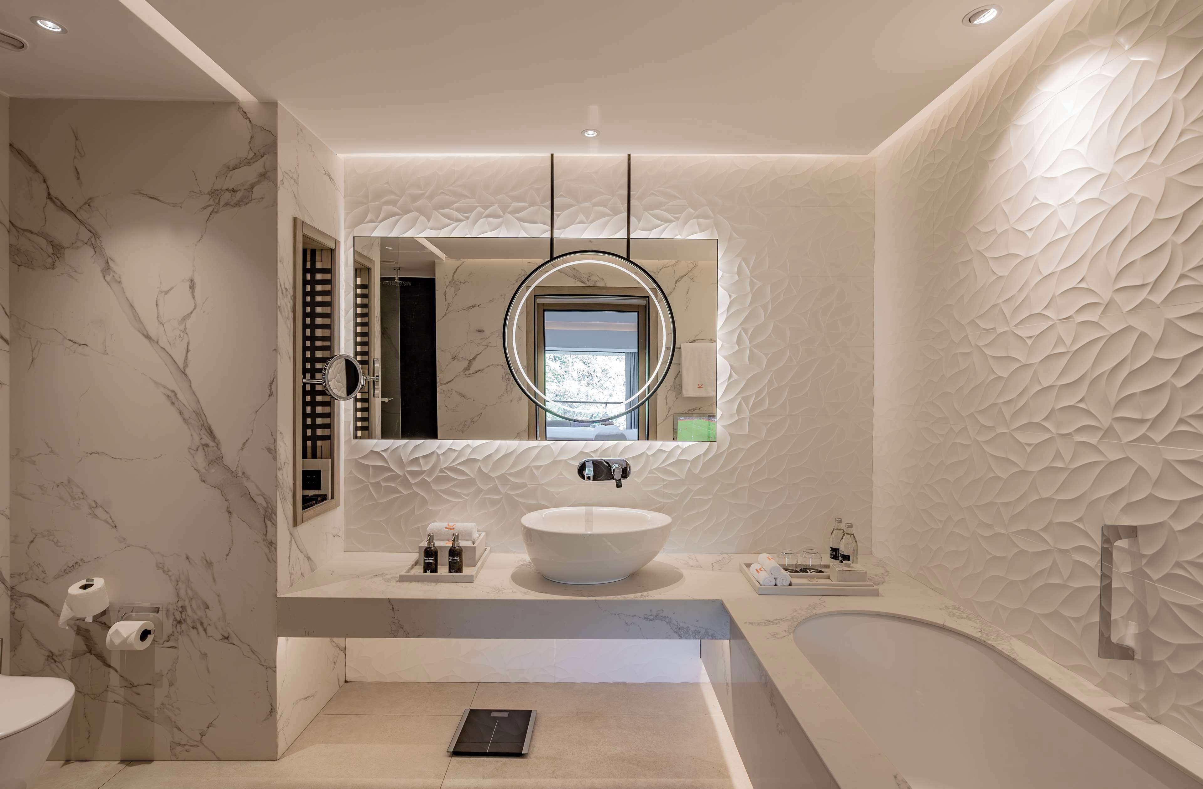 Kwetu King One Bedroom Suite | Bathroom | Deep soaking tub, rainfall showerhead, designer toiletries, hair dryer
