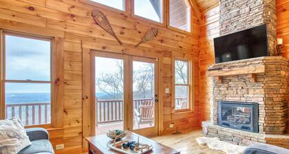 Rustic mountain-view home with deck, fire pit, hot tub, fireplace, & game room