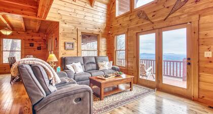 Rustic mountain-view home with deck, fire pit, hot tub, fireplace, & game room