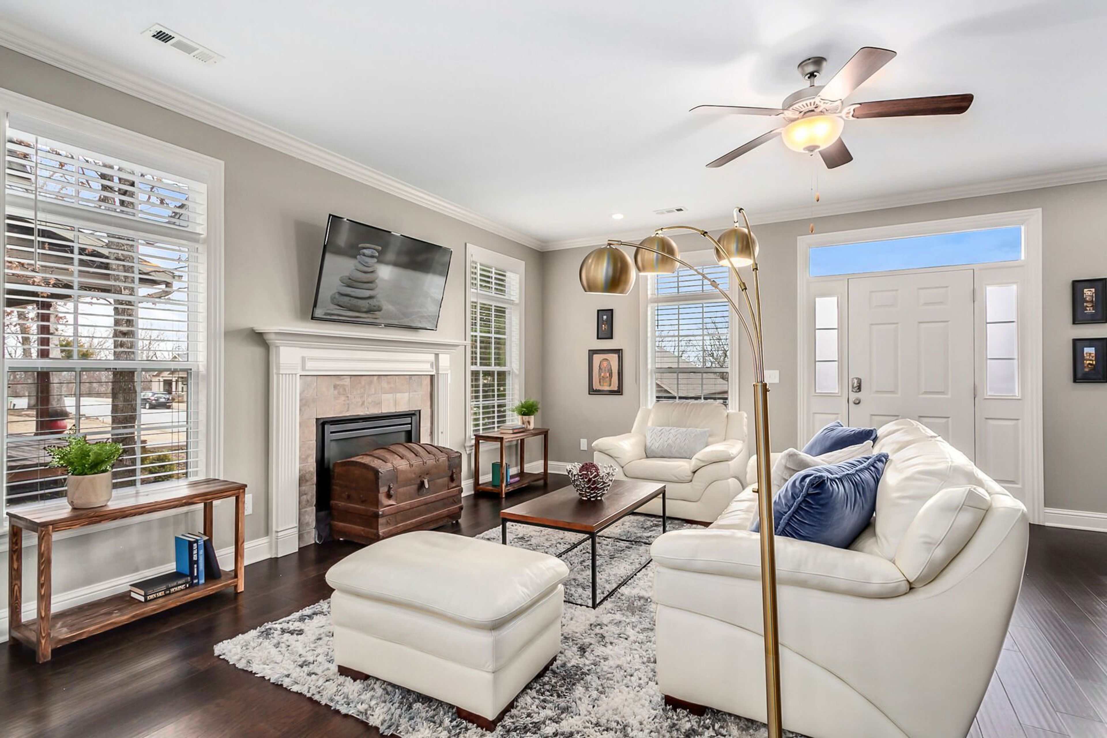 Centrally located home with large back porch, fireplace, washer/dryer, AC