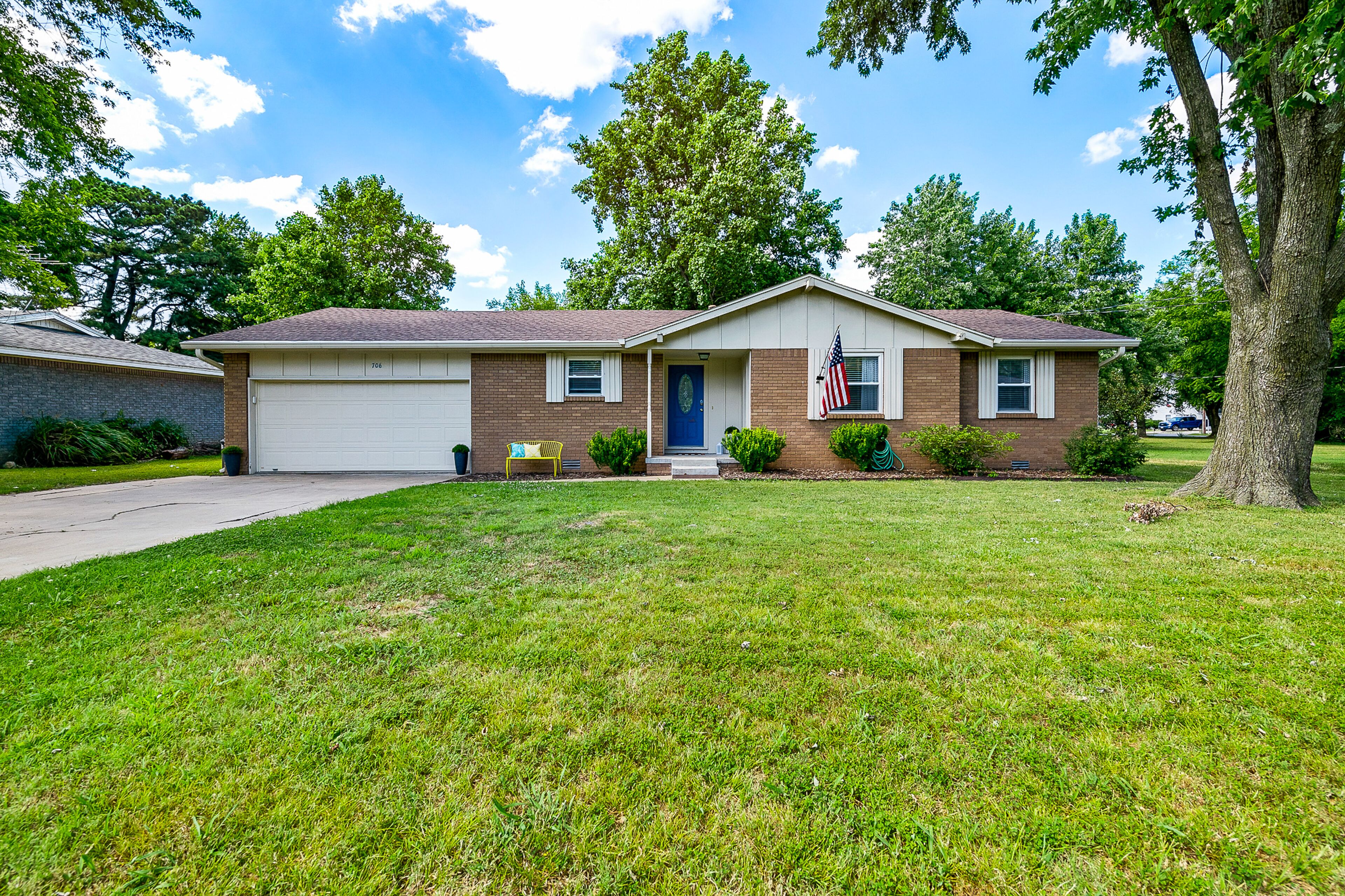 Dog-friendly home with a gas grill, backyard, deck, central AC, & washer/dryer