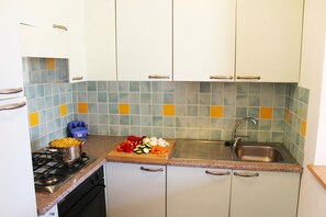 Standard Villa, Multiple Bedrooms (Sea Villas 1Km From The Beach) | Private kitchen | Stovetop, toaster, cookware/dishes/utensils - Sea Villas (Stintino)