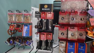 A display of Roman jewelry including key rings, badges, and pendants.