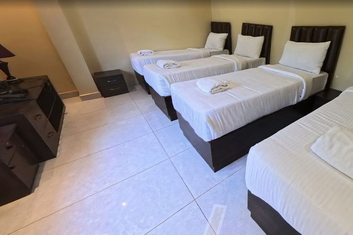 Premium Quadruple Room | In-room safe, iron/ironing board (on request), WiFi (free), bed sheets