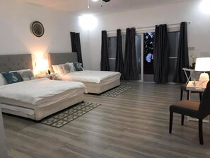 Suite | Caja fuerte, cortinas opacas, ropa de cama