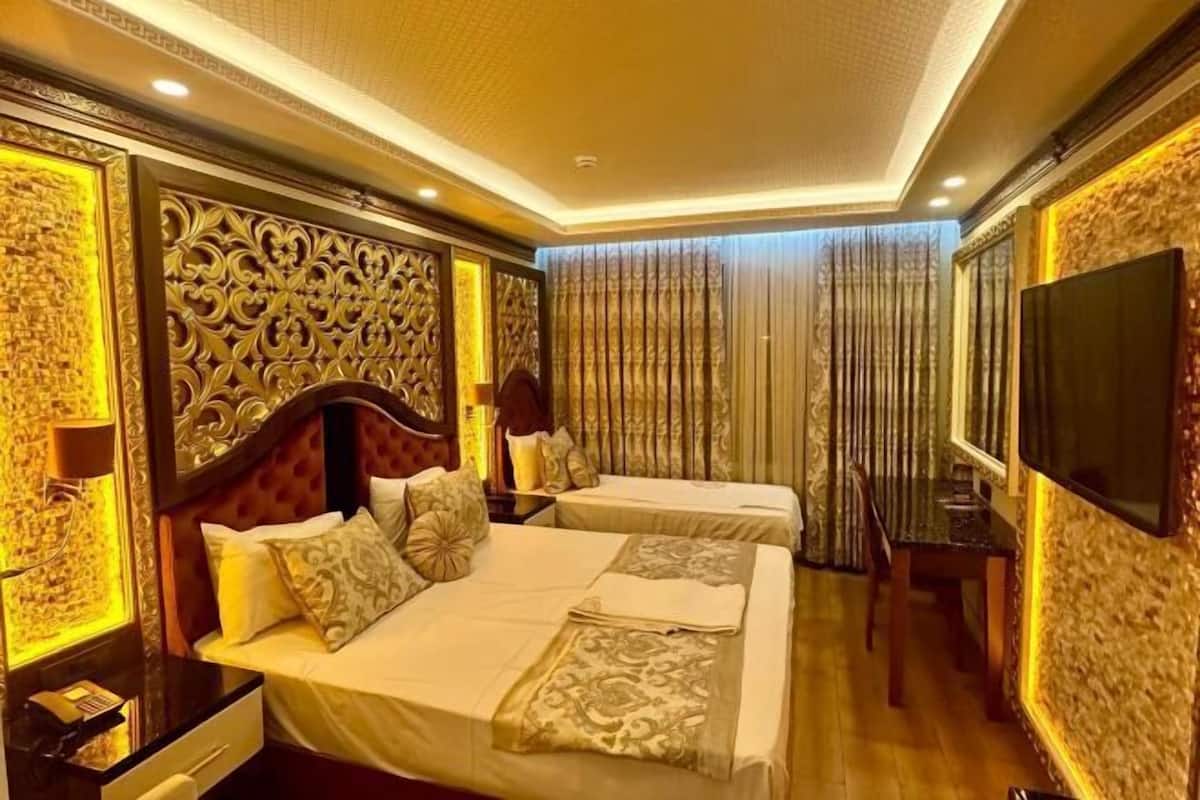 Bộ đồ giường cao cấp, minibar, két bảo mật tại phòng