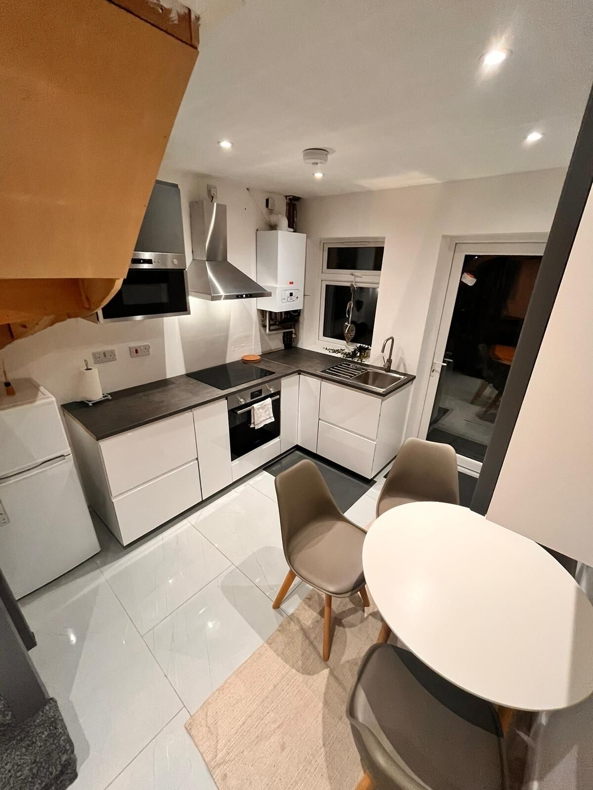 Microwave, oven, dining tables