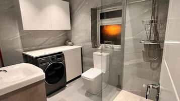 Shower, hair dryer, towels, soap