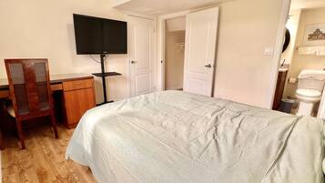 Egyptian cotton sheets, premium bedding, desk, laptop workspace