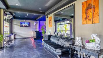 32-inch flat-screen TV with cable channels, TV