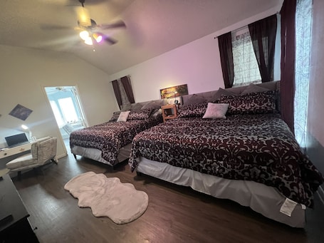 3 bedrooms, desk, iron/ironing board, travel cot. Home away from home..spacious but cozy for the whole family. King size beds