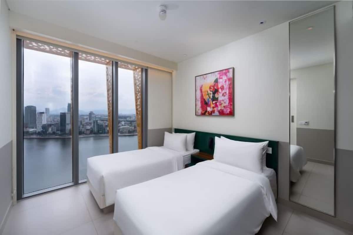 Premium bedding, down comforters, Select Comfort beds, minibar