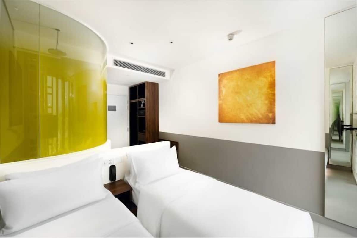 Premium bedding, down comforters, Select Comfort beds, minibar