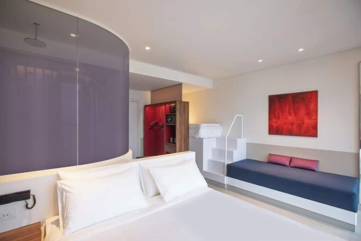 Premium bedding, down comforters, Select Comfort beds, minibar