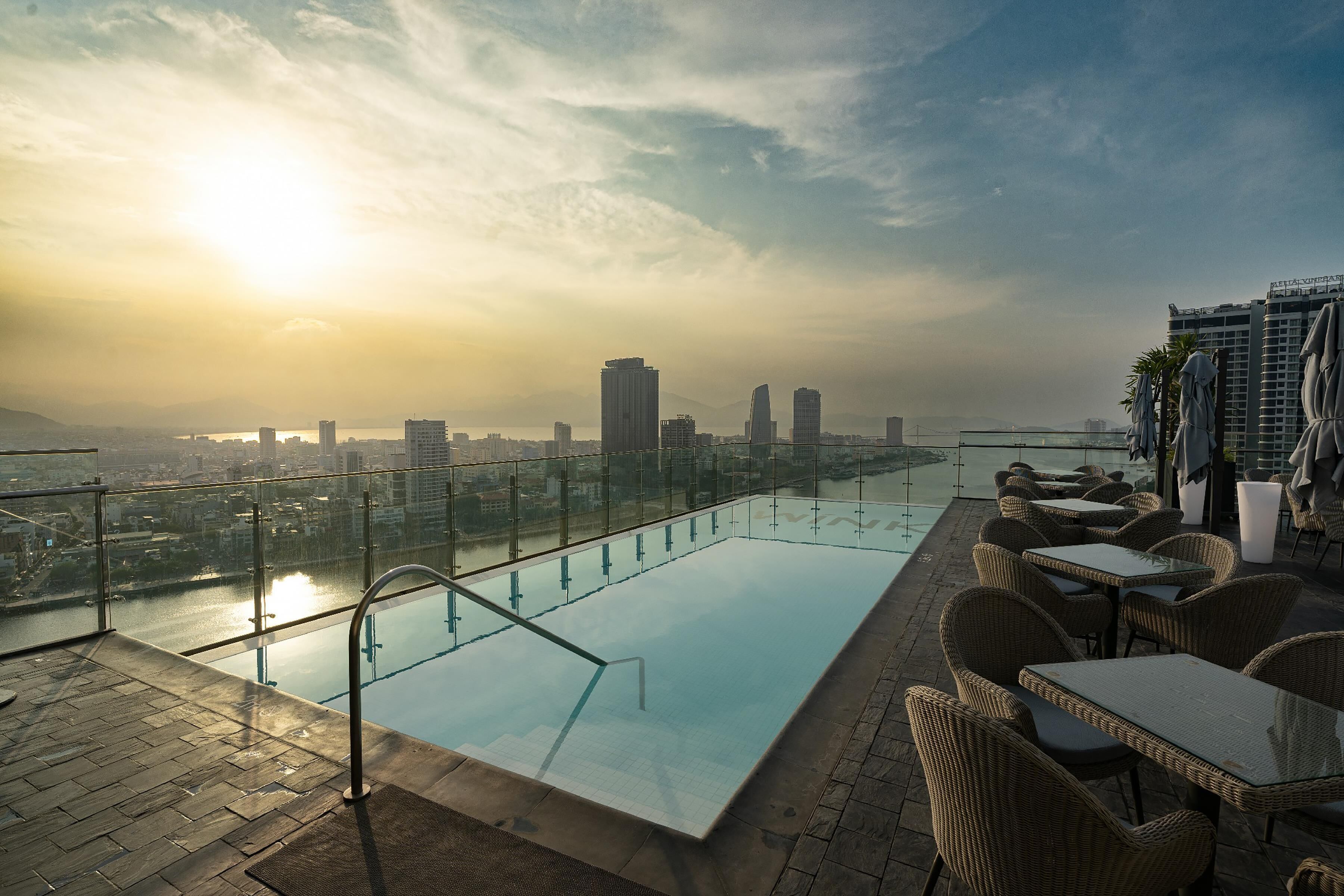 Outdoor pool, pool umbrellas, sun loungers