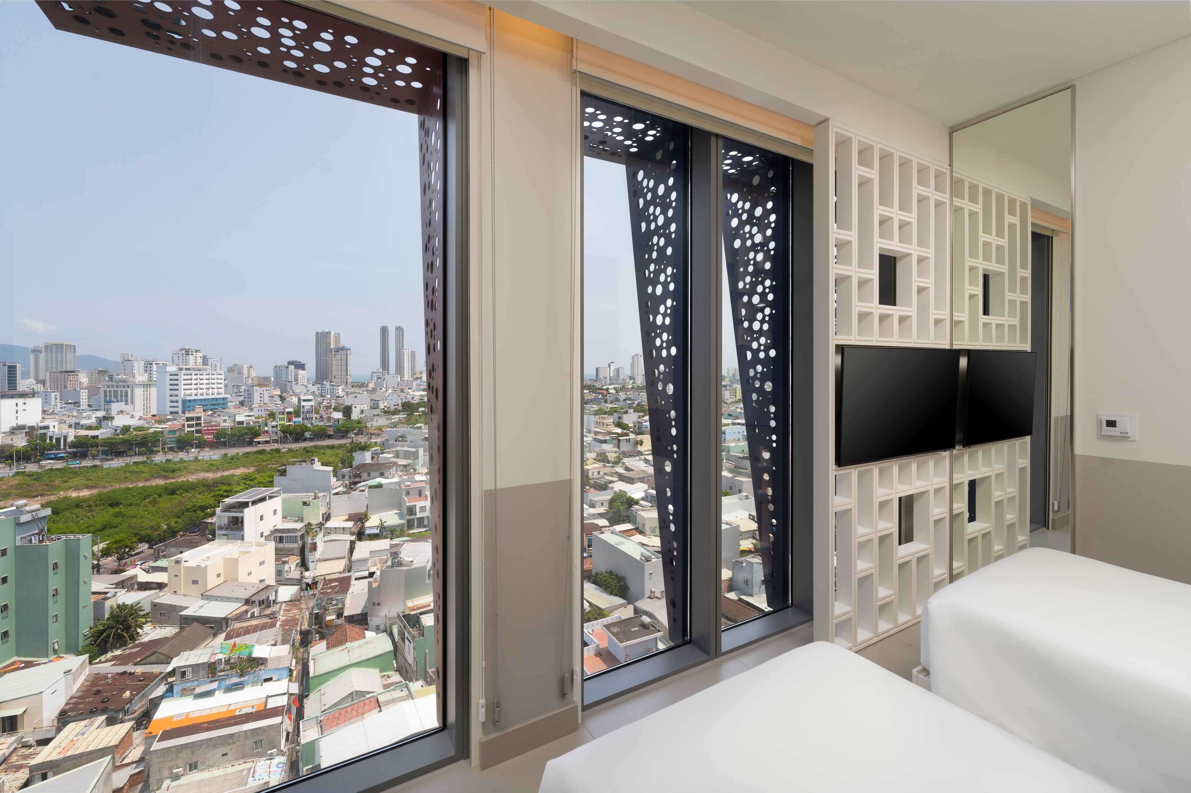 Phòng 3 dành cho gia đình, quang cảnh thành phố | Bộ đồ giường cao cấp, chăn bông, nệm Select Comfort, minibar 